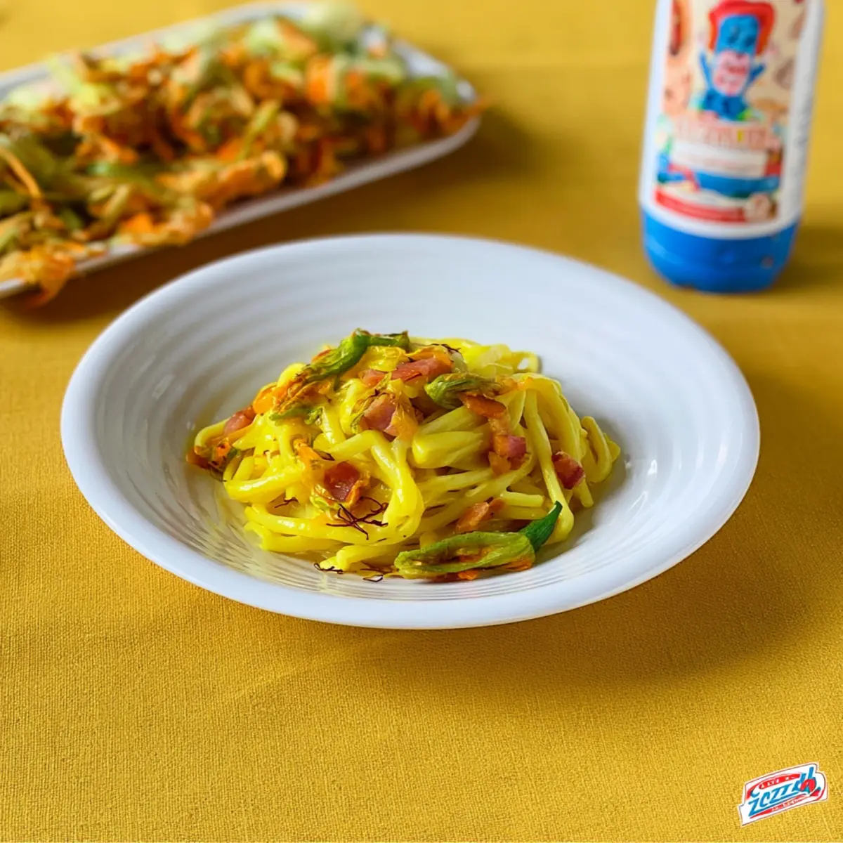 Bucatini con fiori di zucca, guanciale e zafferano