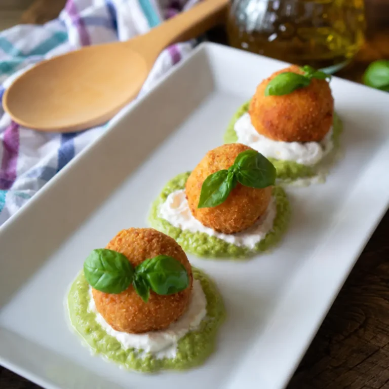 Polpette di gamberi su crema di zucchine e burrata
